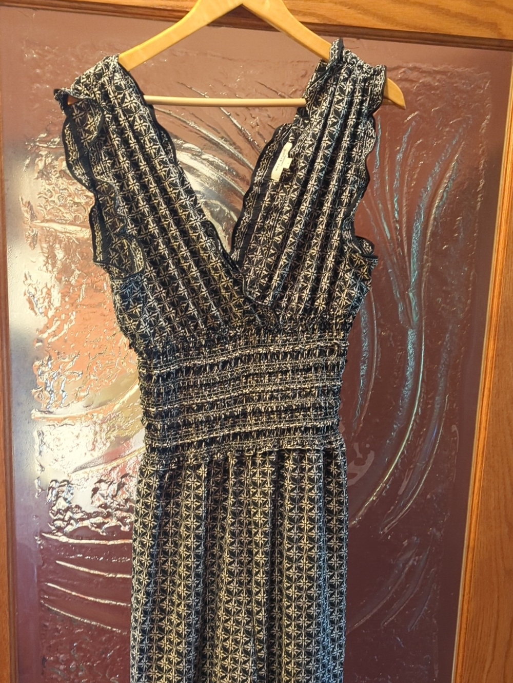 Black and White Sleeveless V-Neck Smocked Waist Jumpsuit